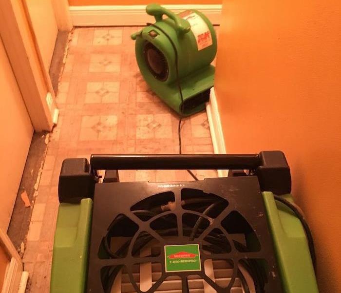 SERVPRO air mover and dehumidifier on tile floor