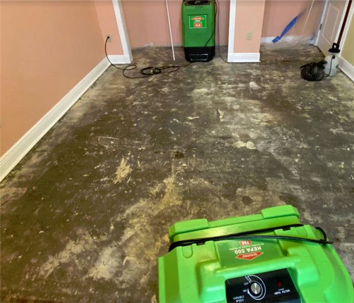 SERVPRO appliances working in a water damaged room